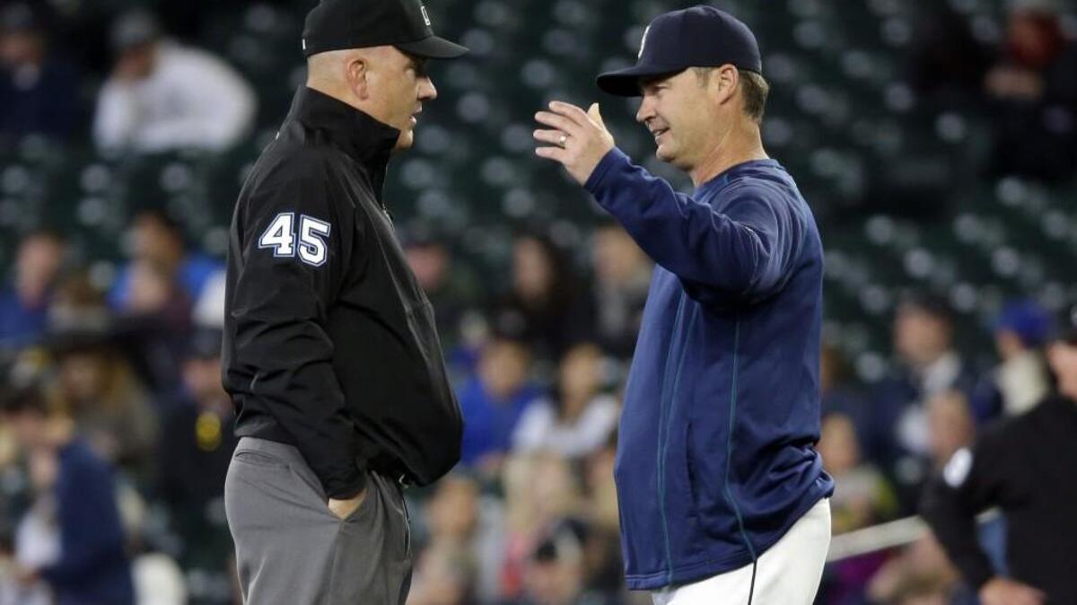 Seattle Mariners manager Scott Servais, right, will be in the dugout for his first game at Yankee Stadium on Friday. Servais spent his entire playing career in the National League.