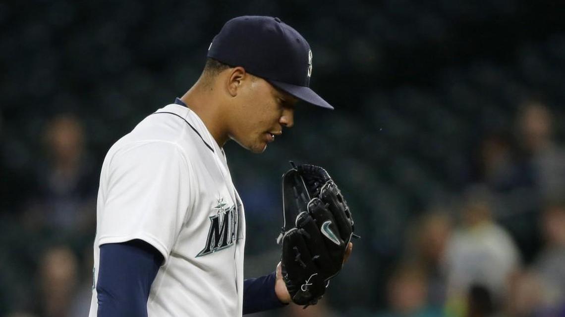 
Seattle Mariners starting pitcher Taijuan Walker pauses on the mound in the fourth inning of a baseball game against the Texas Rangers, Tuesday, Sept. 8, 2015, in Seattle.

