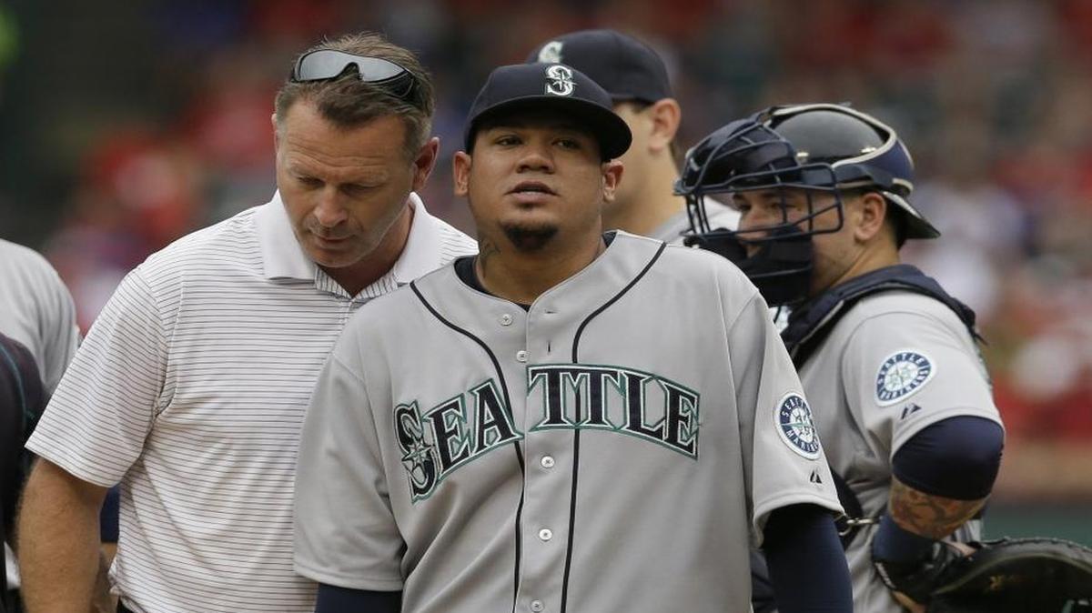 
Stiffness in his pitching elbow is one of the contributing factors that led to the Seattle Mariners shutting down starting pitcher Felix Hernandez, right.
