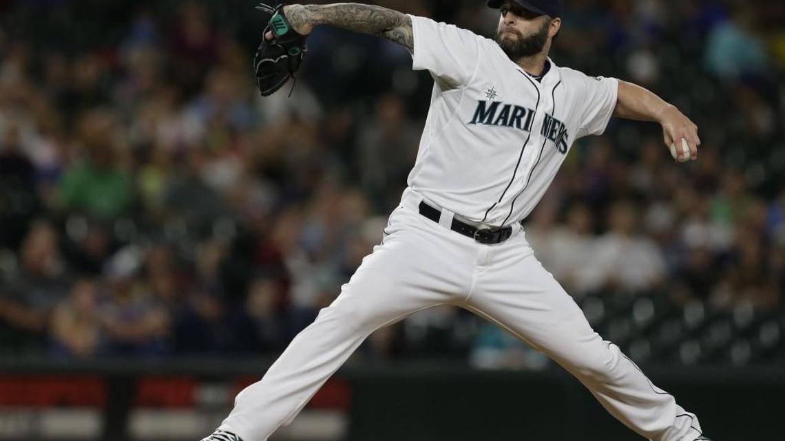 
Seattle Mariners reliever Joe Beimel pitches against the Colorado Rockies on Sept. 12. Beimel has gotten six outs in 43
1/3 innings via his pickoff move this season, but some opposing players want umpires to call a balk.
