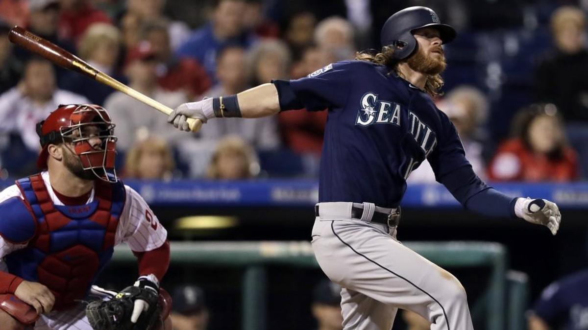 Seattle Mariners' Ben Gamel follows through after hitting a three-run home run off Philadelphia Phillies starting pitcher Jerad Eickhoff during the fourth inning of a baseball game, Tuesday, May 9, 2017, in Philadelphia. At left is Phillies catcher Cameron Rupp. The Mariners won 10-9.