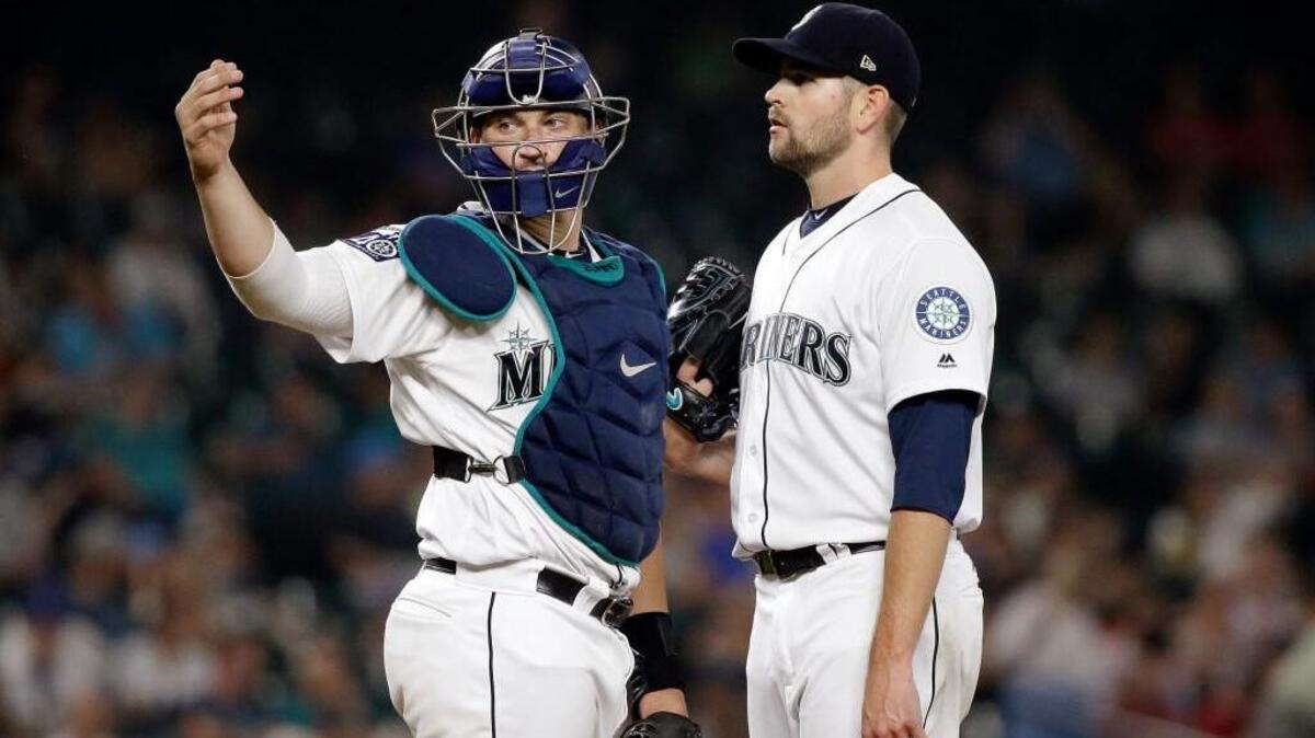 Catcher Mike Zunino signaled for the trainer Thursday night to examine James Paxton, who subsequently left the game because of a strained left pectoral muscle.