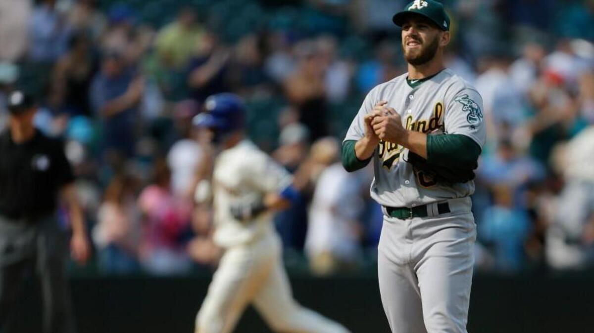 Pitcher Sam Moll, who made his big league debut with Oakland last year at Safeco Field, was signed off waivers by the Mariners on Thursday.