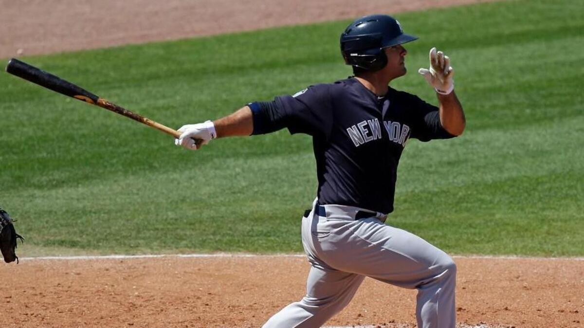New York Yankees' Mike Ford hits a double against the Philadelphia Phillies in the sixth inning of a spring training baseball game, Thursday, March 30, 2017, in Clearwater, Fla.