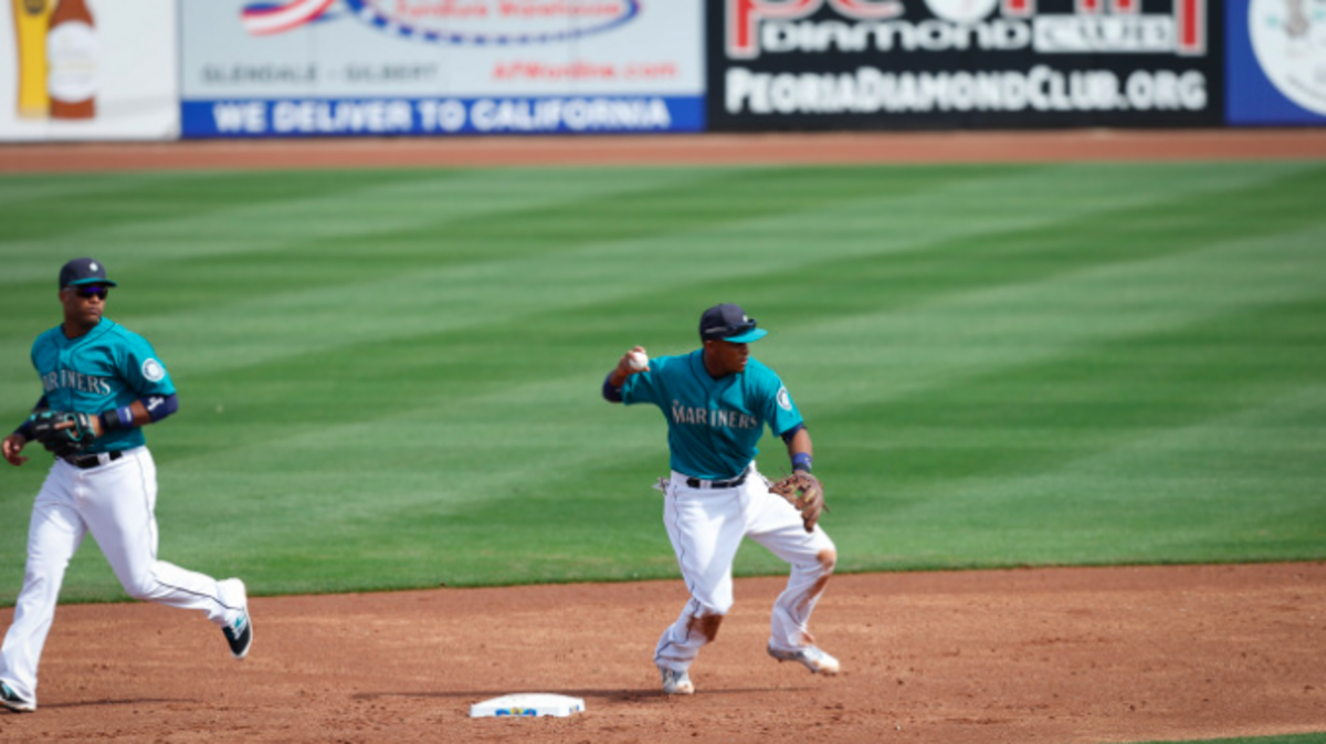 Second baseman Robinson Cano (left) and shortstop Ketel Marte completed an inning-ending double play in the third inning.