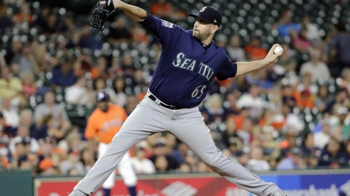 Seattle Mariners starting pitcher James Paxton throws against the Houston Astros during the first inning of a baseball game Friday, Sept. 15, 2017, in Houston. (AP Photo/David J. Phillip)