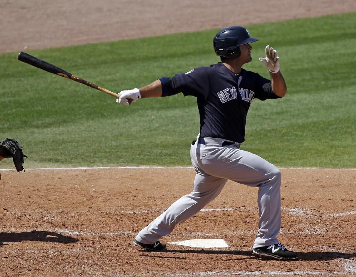 New York Yankees' Mike Ford hits a double against the Philadelphia Phillies in the sixth inning of a spring training baseball game, Thursday, March 30, 2017, in Clearwater, Fla. (AP Photo/John Raoux)