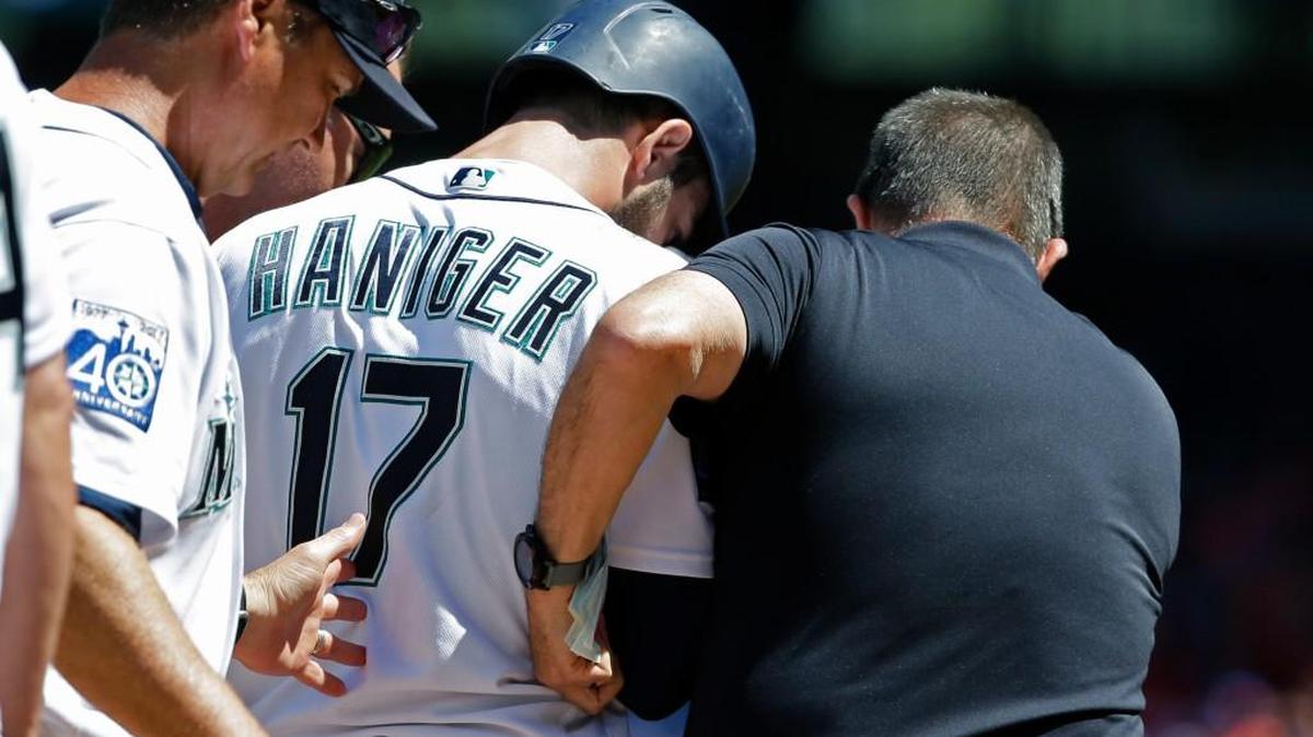 Mitch Haniger had to be helped from the field on July 22 after getting hit in the face by a pitch.
