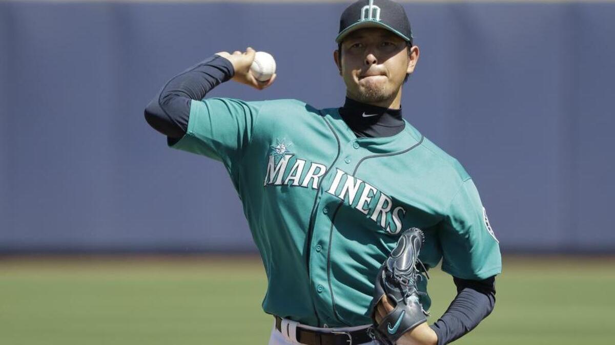 Seattle Mariners' Hisashi Iwakuma, who had shoulder surgery in September, could be back pitching again in mid-May or June, Marinrs manager Scott Servais said Tuesday.