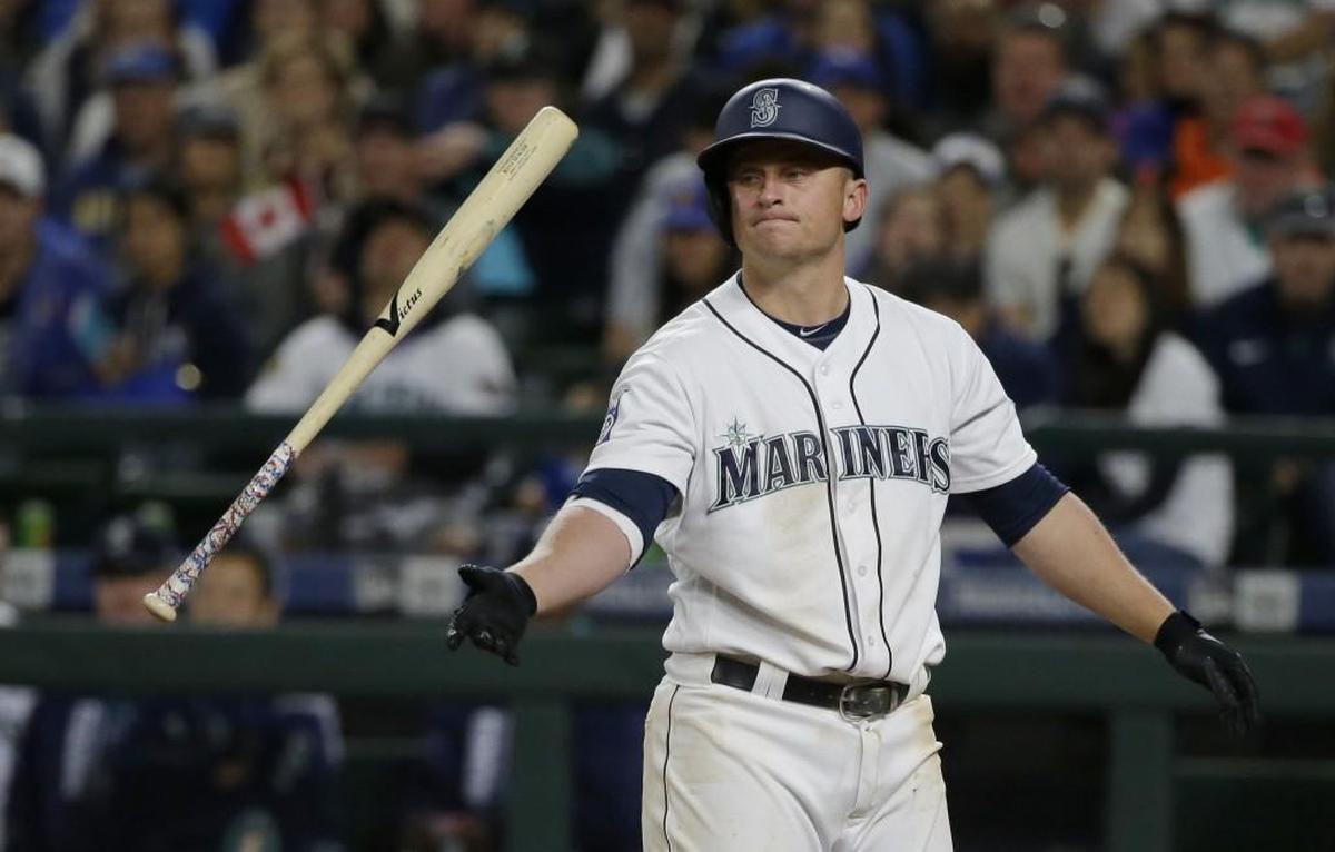 Seattle Mariners' Kyle Seager tosses his bat after striking out swinging with a runner on base during the eighth inning of the team's baseball game against the Toronto Blue Jays, Saturday, June 10, 2017, in Seattle. (AP Photo/Ted S. Warren)