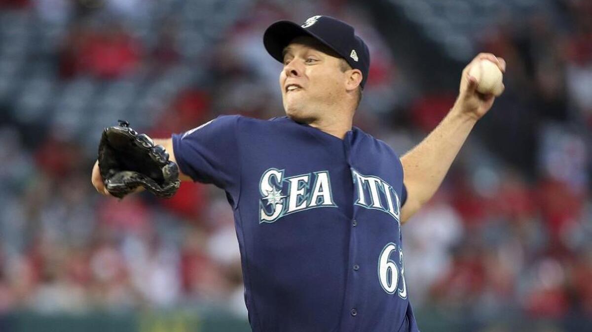 Seattle Mariners starter Andrew Albers pitches to the Los Angeles Angels in the first inning of a baseball game in Anaheim, Calif., Saturday, Sept. 30, 2017. He was released from his contract on Monday to he can pitch in Japan.