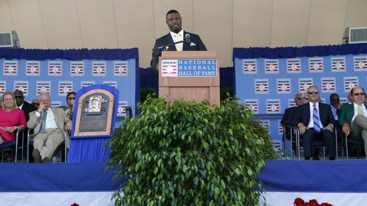 National Baseball Hall of Fame inductee Ken Griffey Jr. speaks during the induction ceremony at Clark Sports Center on Sunday, July 24, 2016, in Cooperstown, N.Y. (AP Photo/Mike Groll)