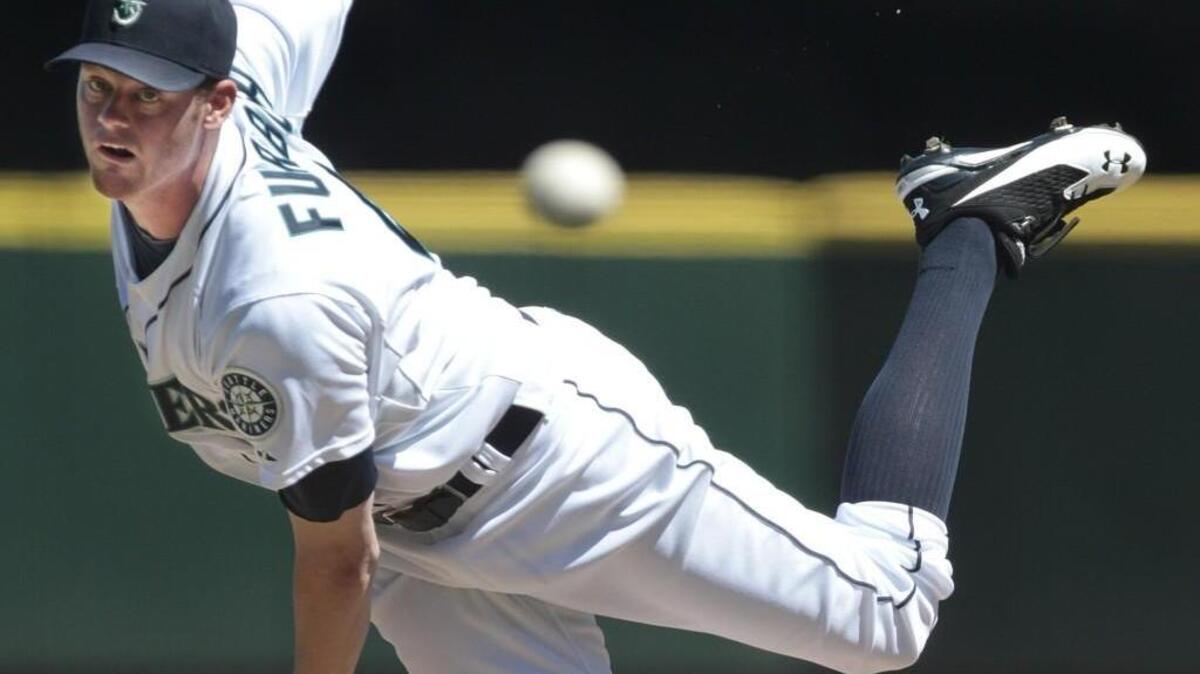 Seattle Mariners starting pitcher Charlie Furbush throws against the Oakland Athletics on Aug. 3.