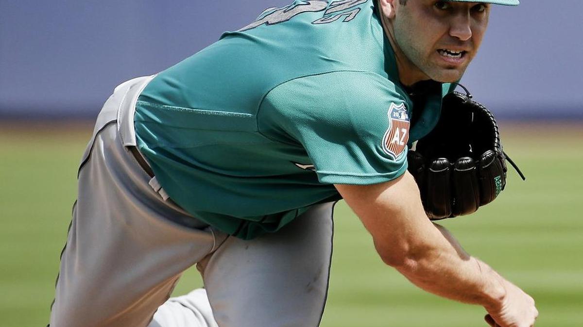Mariners starter Nathan Karns delivers a pitch in the second inning against the Padres on Thursday. Karns struggled a bit in a 22-pitch first inning, but sailed through the second on 10 pitches. Seattle won, 6-5.