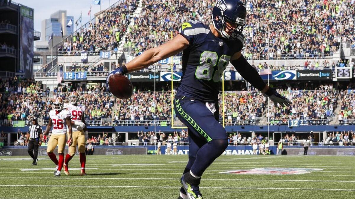 Seahawks tight end Jimmy Graham celebrates his second-quarter touchdown catch against the 49ers on Sunday. Graham finished with six receptions for 100 yards.