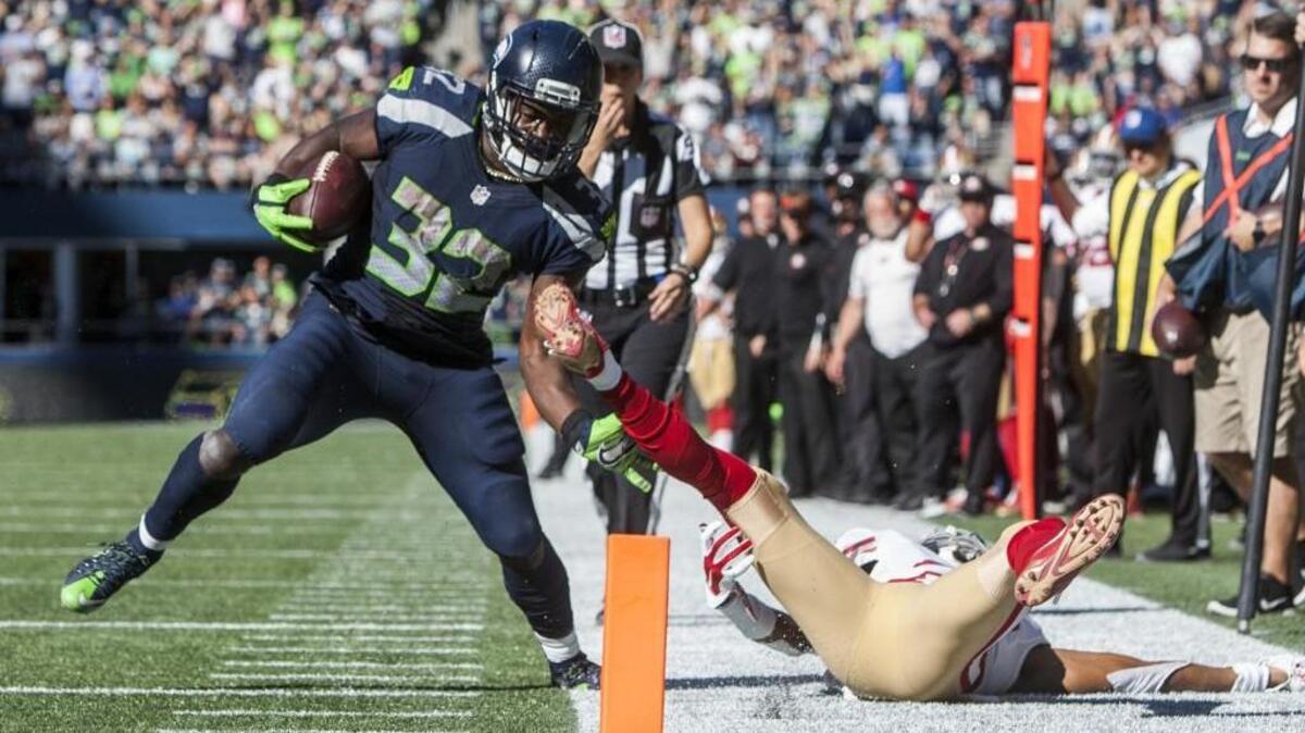 Seattle Seahawks running back Christine Michael (32) is knocked out of bounds just before the end zone in the third quarter Sunday against the San Francisco 49ers.