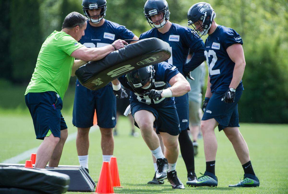 Former University of Washington tight end Will Dissly (88) does drills during Seahawks rookie minicamp at the Virginia Mason Athletic Center in Renton last week. The converted defensive lineman, known as the best run-blocking tight end in this draft class, impressed his new NFL team with his receiving skills