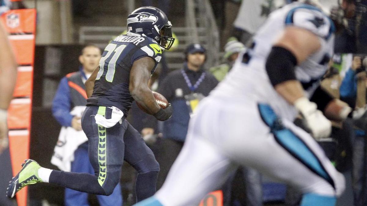 
Seahawks safety Kam Chancellor runs an interception back 90 yards for a touchdown in the fourth quarter Jan. 10 against the Carolina Panthers in NFC divisional playoff game in Seattle. 
