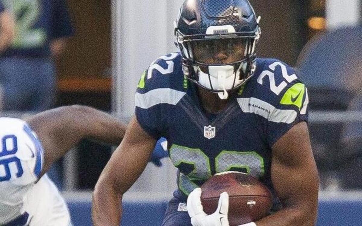 Seattle running back C.J. Prosise runs in the second quarter Thursday against Dallas at CenturyLink Field . Prosise played in the first half, spelling starter Christine Michael on third down