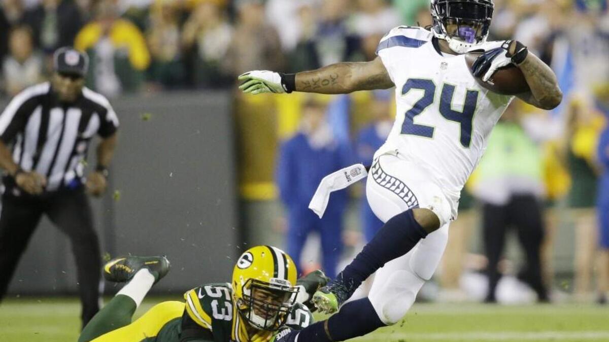The tough playing style of Seattle’s Marshawn Lynch (24) is one of the keys to this physical matchup with Carolina.