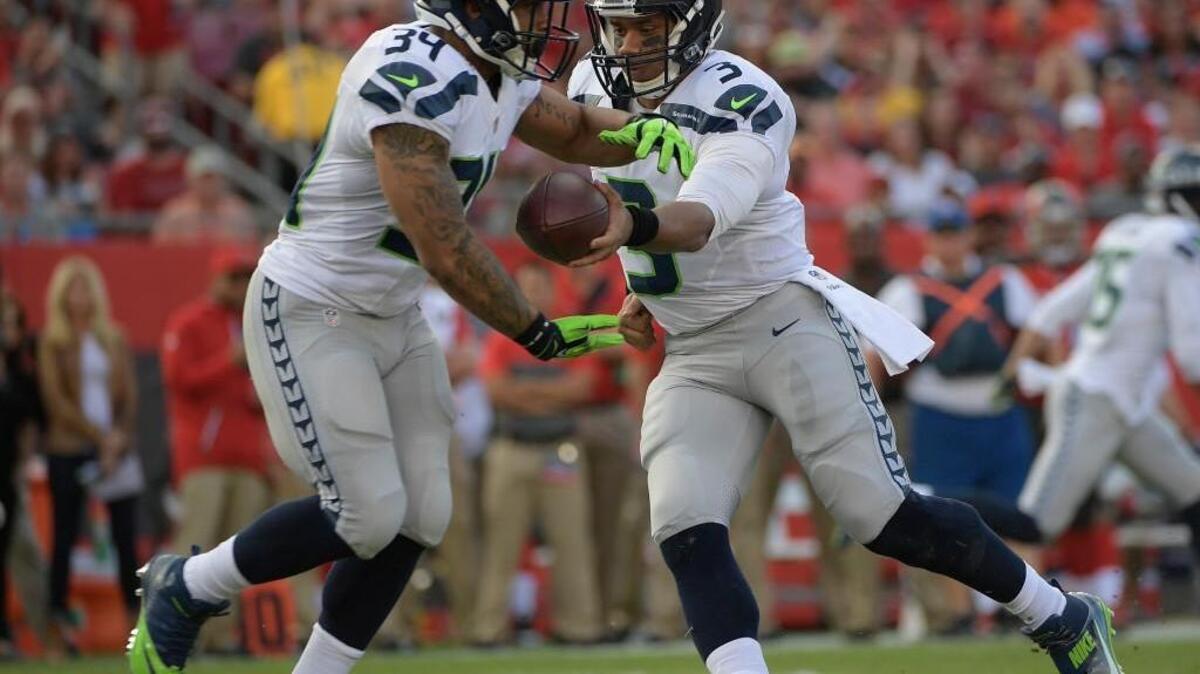 Running back Thomas Rawls (34) had a rough day Sunday against the Tampa Bay Buccaneers. But Seahawks coach Pete Carroll likes what he saw this week. “Thomas had his best … he truly had his best week,” Carroll said. “I’m really excited about that.”