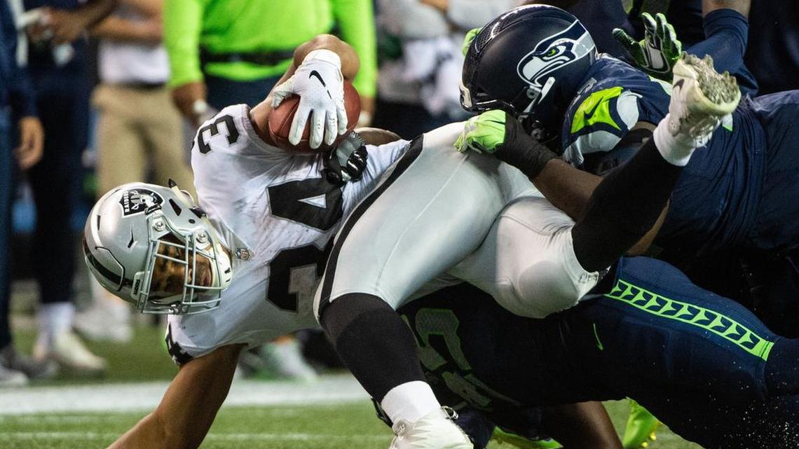 Safety Maurice Alexander (35) tackles Oakland Raiders running back Chris Warren III (34) during the Seahawks’ final game of this preseason Aug. 30. Seattle released Alexander two days later. The team is bringing him back on a new contract, according to a report.