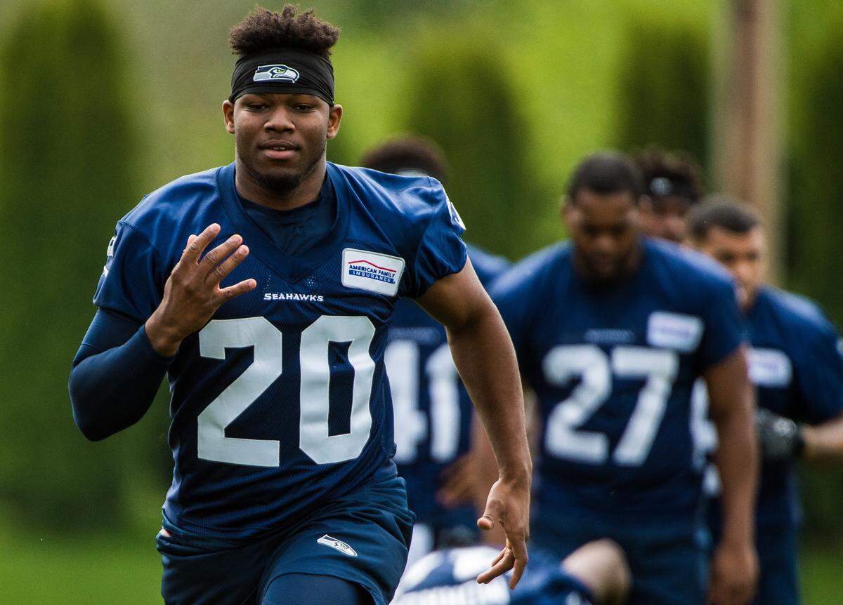 Rookie first-round draft choice Rashaad Penny (20) has a broken finger and was in Philadelphia Wednesday morning for hand surgery, league source confirmed to The News Tribune. The running back is expected to miss up to a month.
