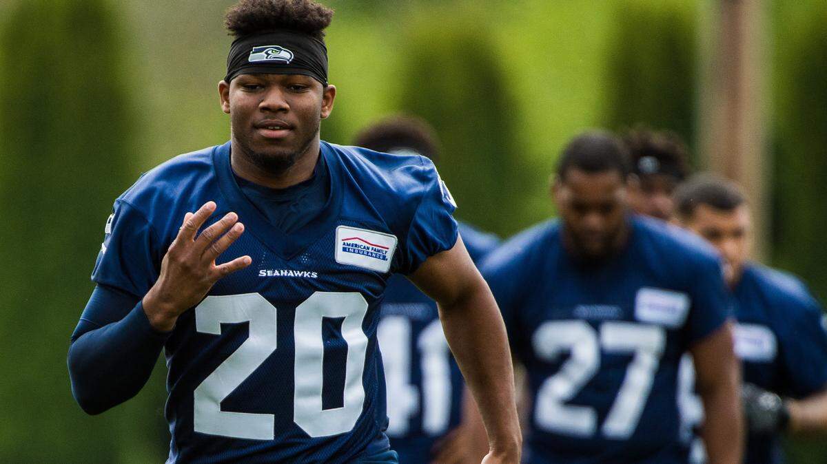 Rookie first-round draft choice Rashaad Penny (20) has a broken finger and was in Philadelphia Wednesday morning for hand surgery, league source confirmed to The News Tribune. The running back is expected to miss up to a month.