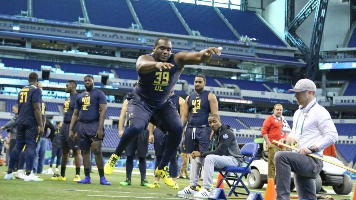 Mississippi State offensive tackle Justin Senior competes in the broad jump at the 2017 NFL football scouting on March 3, 2017, in Indianapolis. The Seahawks selected Senior on Saturday with the No. 210 pick.