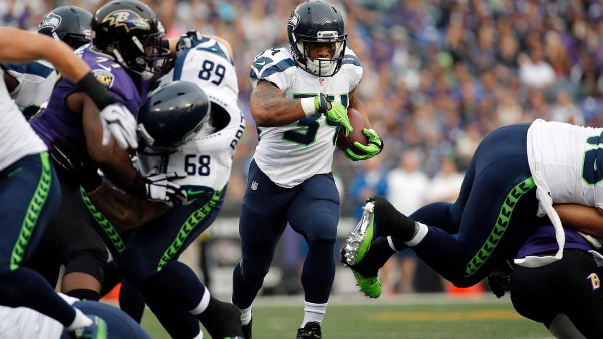 Seahawks running back Thomas Rawls runs the ball Sunday against the Ravens. Rawls broke his ankle in the first quarter and will miss the rest of the season.