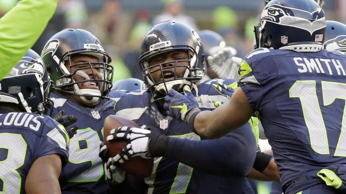 In 13 games Seahawks defensive tackle Ahtyba Rubin, center with ball, has 29 tackles, two sacks and one memorable interception, which Rubin celebrates with teammates on Nov. 29 against Pittsburgh.
