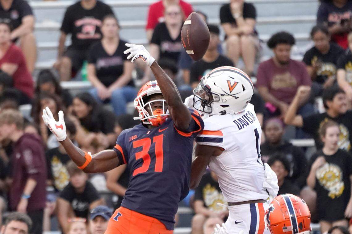 Illinois defensive back Devon Witherspoon breaks up a pass in the end zone intended for Virginia’s Lavel Davis Jr., during the second half of an NCAA college football game Saturday, Sept. 10, 2022, in Champaign, Ill. Illinois won 24-3. Witherspoon was drafted by the Seattle Seahawks in with the fifth pick in the first round of the 2023 NFL Draft.
