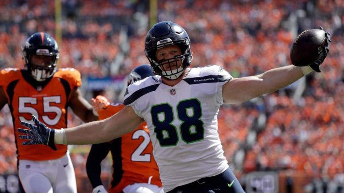 Seahawks 2018 rookie Will Dissly from the University of Washington scores his first NFL touchdown in last season’s opening game at Denver. The former UW defensive lineman, the first tight end to have 100 yards receiving with a touchdown catch in his first NFL game, is recovering well from a season-ending knee injury and surgery, coach Pete Carroll said Tuesday at the league’s annual meetings in Phoenix.