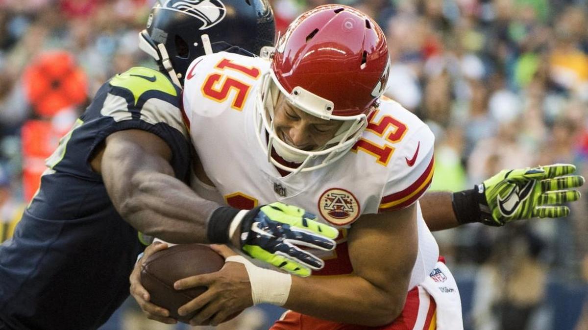Seahawks defensive lineman David Bass (47) sacks Chiefs quarterback Patrick Mahomes in the third quarter. The Seattle Seahawks played the Kansas City Chiefs in a preseason game at CenturyLink Field in Seattle, Wash., on Friday, August 25, 2017.
