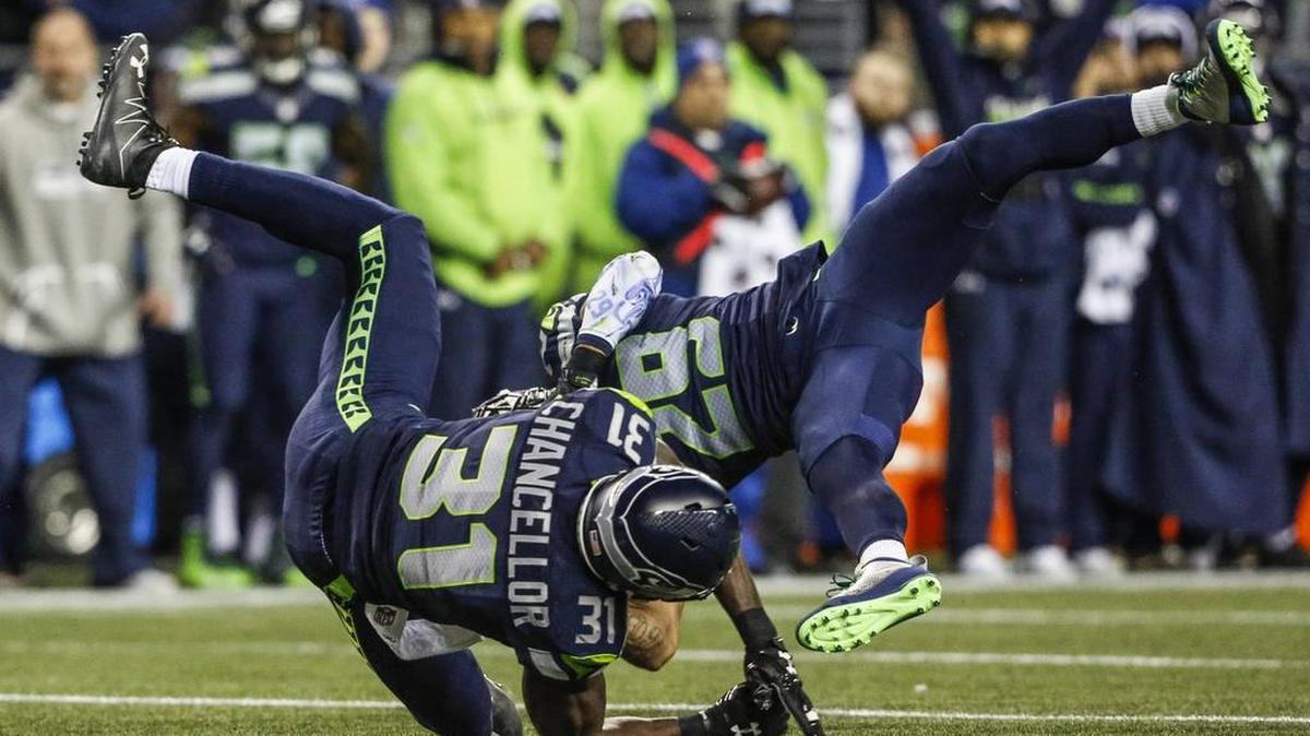 Seattle’s Kam Chancellor (31) and Earl Thomas (29) collide in the Dec. 4 game against Carolina. Thomas, the three-time All-Pro free safety, broke his tibia on the play. In the past four games without Thomas, the Seahawks allowed their first 30-point games of this season.