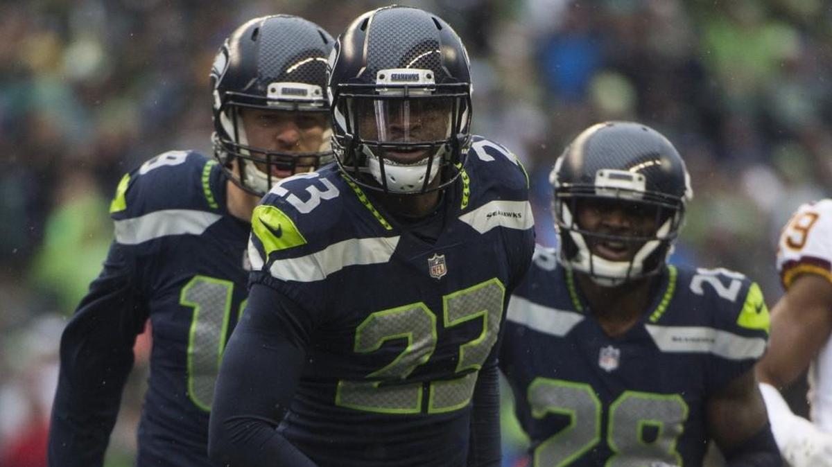 Seahawks wide receiver Tanner McEvoy (19), Seahawks corner back Justin Coleman (28) and Seahawks corner back Neiko Thorpe (23) celebrate a hit by Thorpe on a kick return. Thorpe has nine special teams tackles this year as the Seahawks’ gunner.