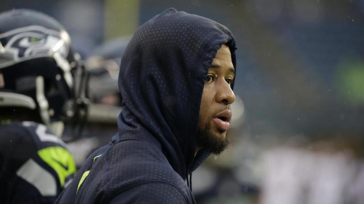 
Seattle’s Earl Thomas watches warmups before an exhibition game Friday. Thomas practiced Tuesday for the first time since undergoing shoulder surgery on Feb. 24.
