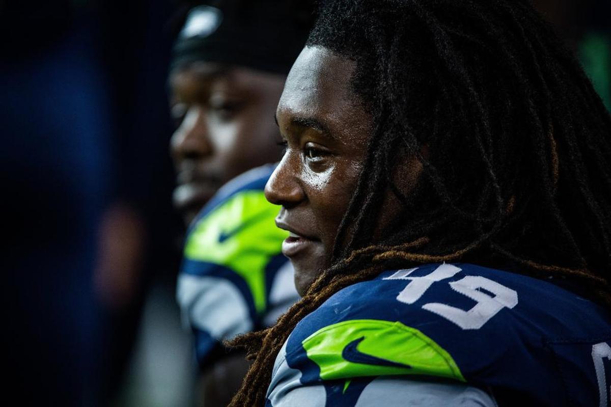 Rookie linebacker Shaquem Griffin chats with teammates players on the Seahawks’ bench during Thursday night’s preseason opener against the Indianapolis Colts at CenturyLink Field. The fifth-round draft pick, the first one-handed player drafted into the modern NFL, continued his wondrous debut summer with a game-high nine tackles in his first pro game.