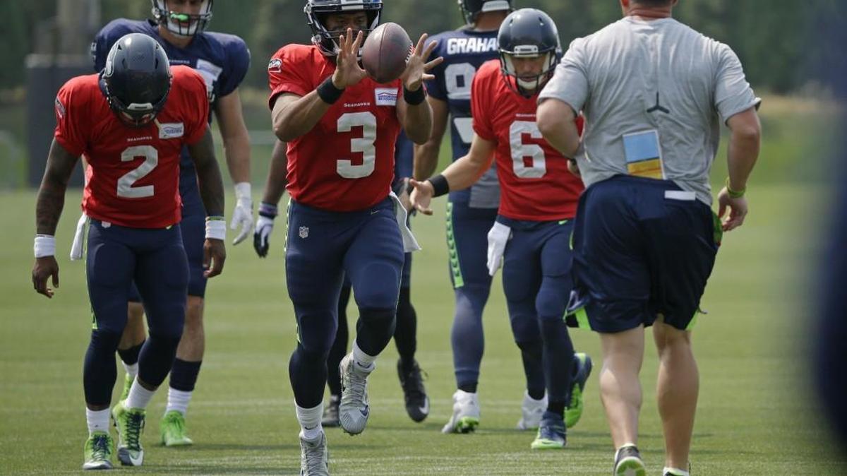 Seahawks quarterback Russell Wilson (3) will again have Austin Davis (6) as his backup at quarterback in 2018. But Trevone Boykin (2) is gone. And Colin Kaepernick's name is still lingering around the team.