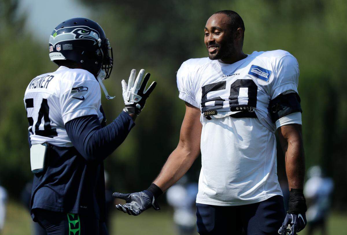 Pro Bowl veteran K.J. Wright, right, and his All-Pro middle-linebacker partner Bobby Wagner, left, will play together again in 2019. That’s because Wright signed a two-year contract extension worth up to $15 million on Thursday, instead of leaving in free agency.
