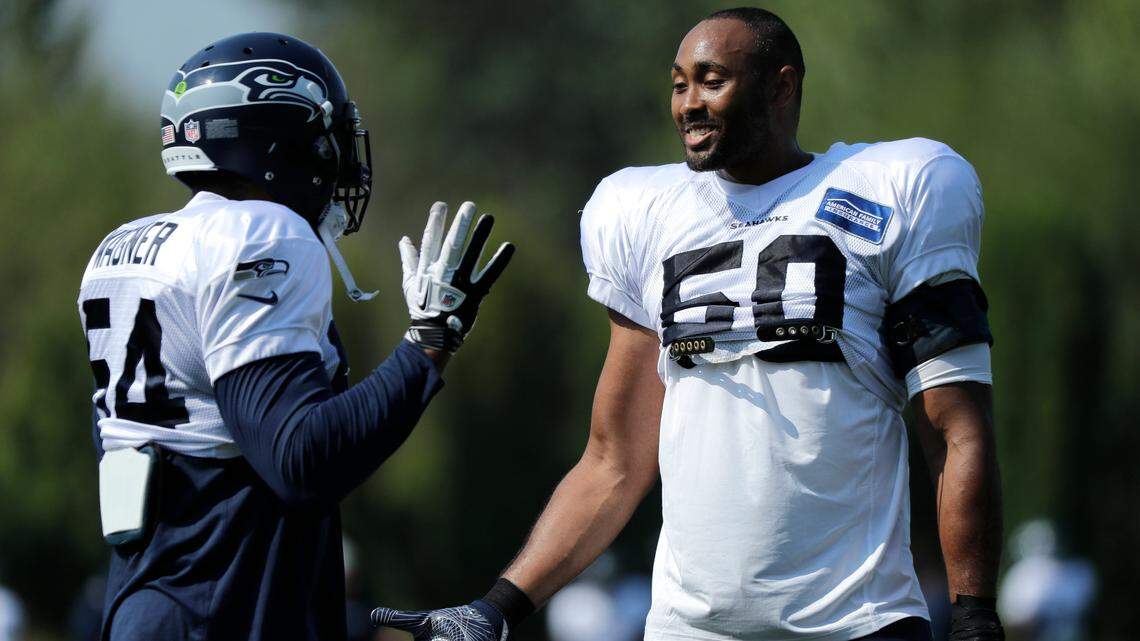 Pro Bowl veteran K.J. Wright, right, and his All-Pro middle-linebacker partner Bobby Wagner, left, will play together again in 2019. That’s because Wright signed a two-year contract extension worth up to $15 million on Thursday, instead of leaving in free agency.