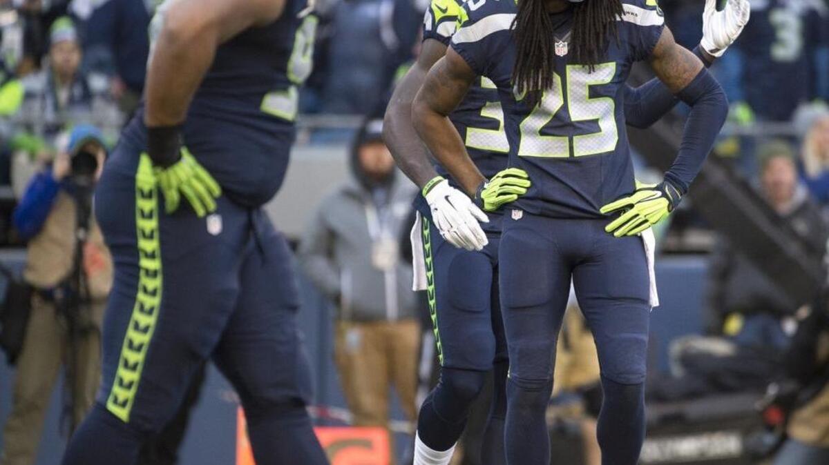 A frustrated-looking Seahawks cornerback Richard Sherman reacts after the defense allowed a 49ers touchdown reception during Sunday’s 29-13 win over San Francisco at CenturyLink Field.