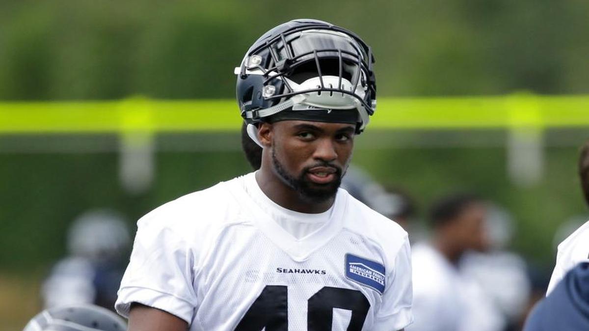 Seattle Seahawks' Tyvis Powell walks on the field during the team's NFL football training camp Saturday, July 30, 2016, in Renton.