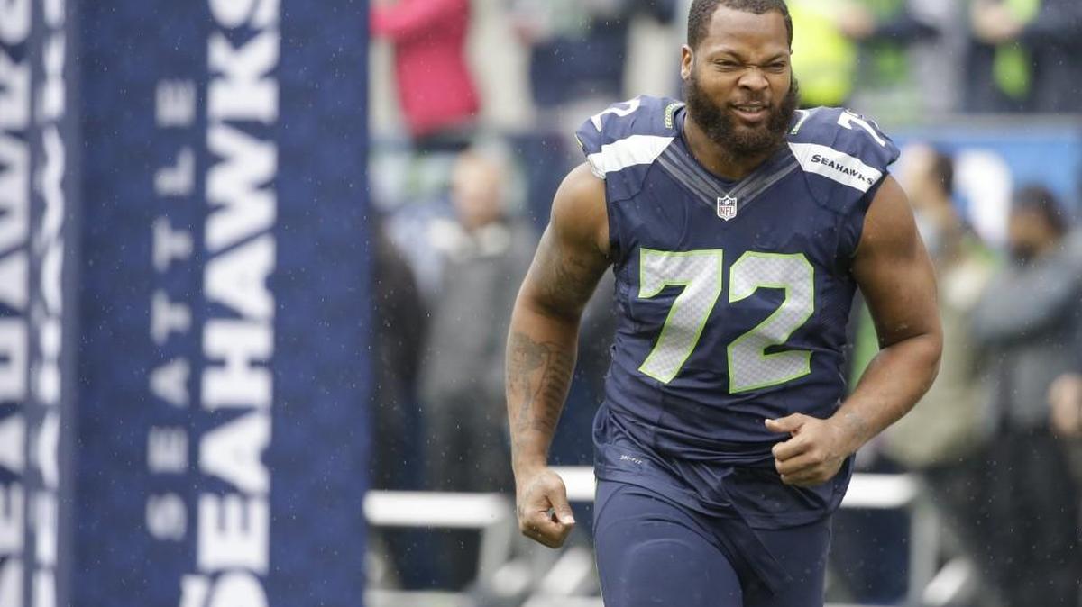 Seattle Seahawks defensive end Michael Bennett agreed to a three-year extension with the team