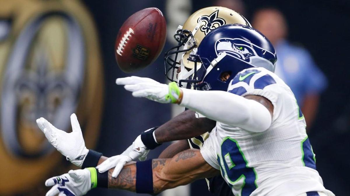 Seattle’s Earl Thomas (29) breaks up a pass intended for New Orleans’ Brandin Cooks on Sunday in the first half in New Orleans.