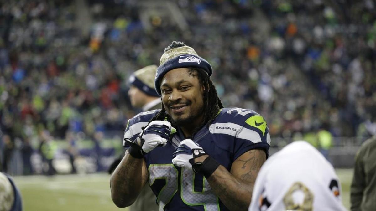 Seattle Seahawks running back Marshawn Lynch talks to teammates on the sideline during a Nov. 15 game against the Arizona Cardinals.