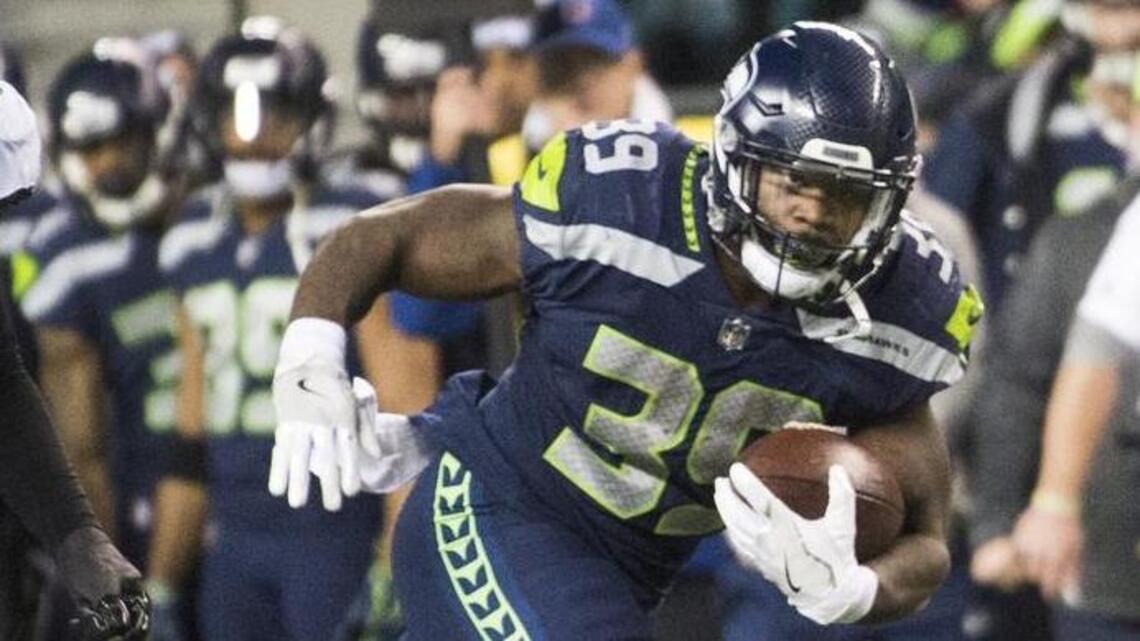 Seahawks bring back running back Mike Davis with free-agent contract