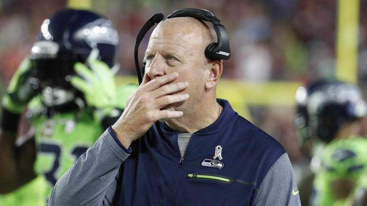 Seattle Seahawks assistant head coach Tom Cable walks the sidelines during the second half of an NFL football game against the Arizona Cardinals, Thursday, Nov. 9, 2017, in Glendale, Ariz.
