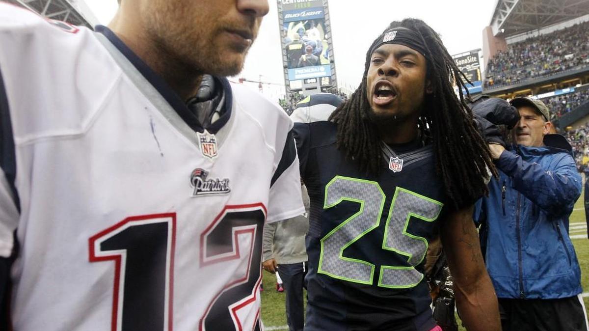 Seahawks then-second-year cornerback Richard Sherman gets into the face of New England championship quarterback Tom Brady after Sherman intercepted him and upstart Seattle beat Brady’s Patriots 24-23 on Oct. 14, 2012, at CenturyLink Field.