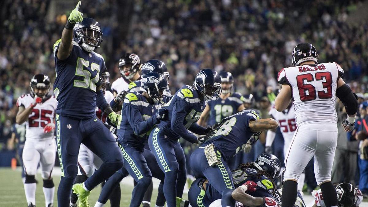 Seahawks linebacker Terence Garvin (52) reacts after Seahawks safety Tedric Thompson recovered a muffed kick return in the second quarter on Nov. 20, 2017 against Atlanta at CenturyLink Field.